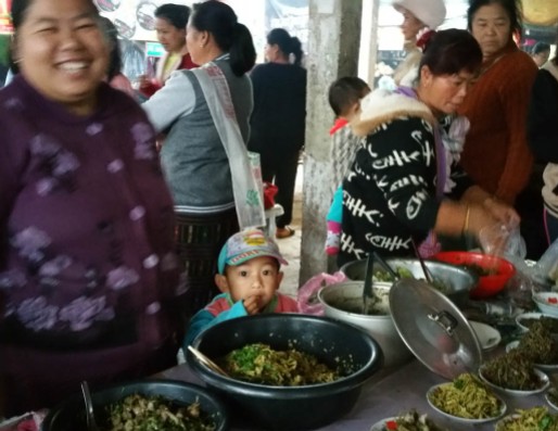 Cheeky little face in Muang La market